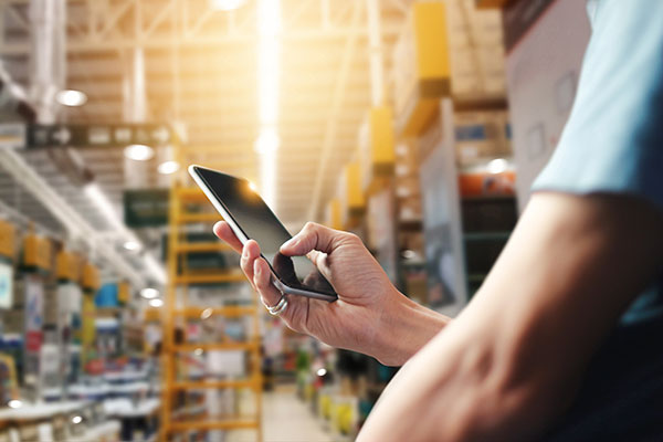 A hand using a cellphone